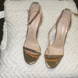 Rose gold strapped heel sandal